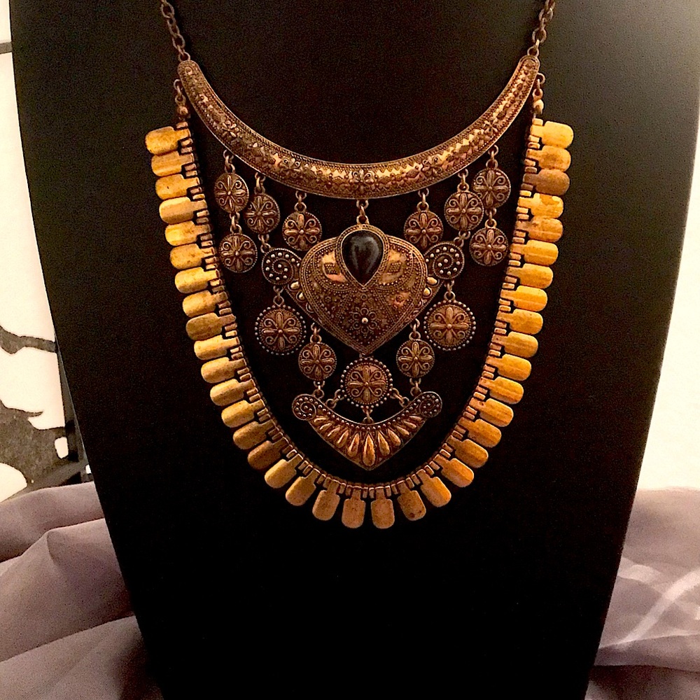 Brass tone bohemian style necklace. Unbranded, pre owned in very good condition